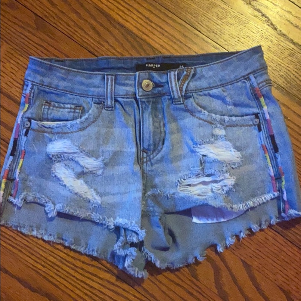 light blue denim shorts with rips
